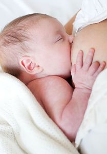 Newborn baby breastfeeding